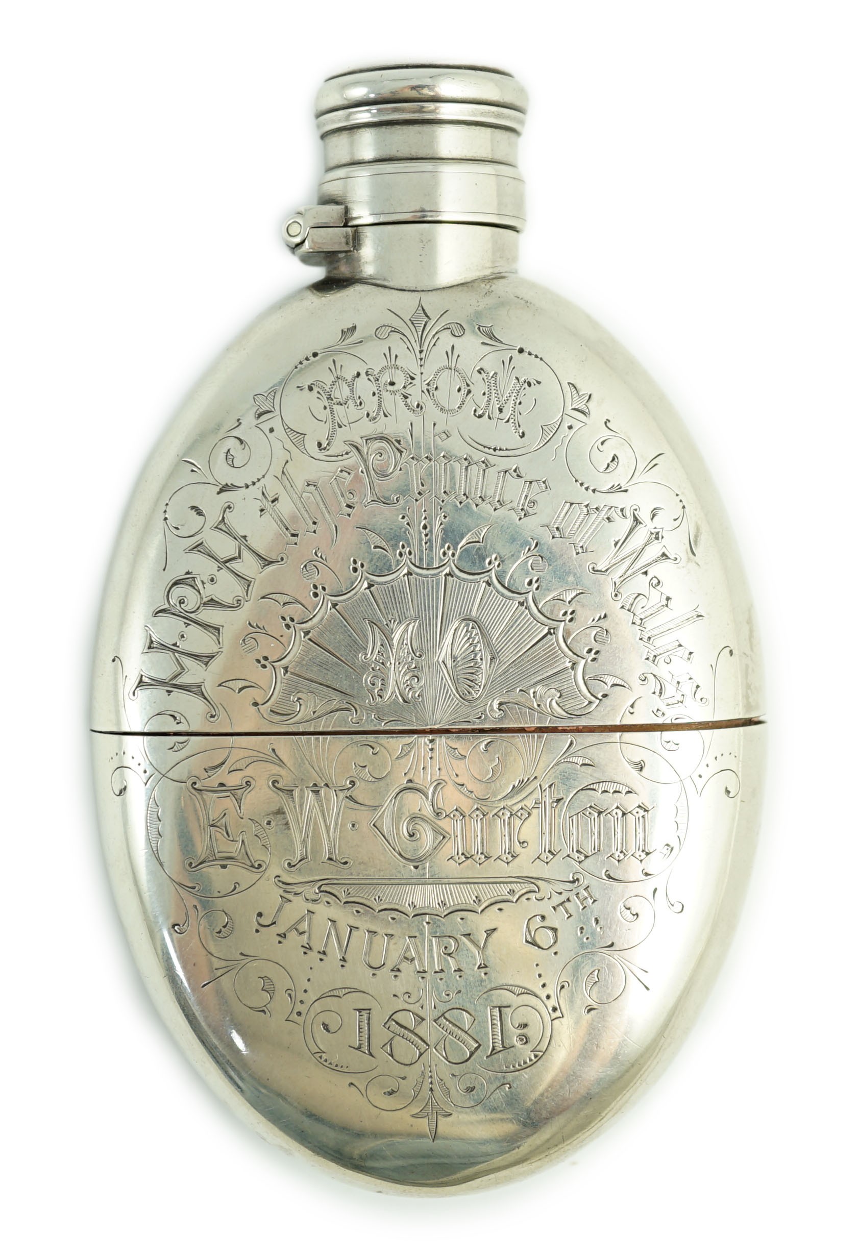 A late Victorian silver oval hip flask, with Royal presentation inscription 'From H.R.H. the Prince of Wales to E.W. Curton, January 6th, 1881'